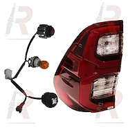 FARO TOY HILUX (TRA) 21/25 IZQ C/LED Y PORTA LAMP