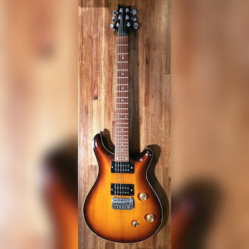 Guitarra Electrica USADA Tipo PRS con palanca. USADA FAIM