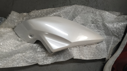 Embellecedor Optica izq Blanco Yamaha Sz 150 orig - $ 41.735