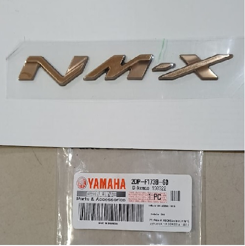 Emblema Yamaha NMX 155 Original dorado - $ 42.500